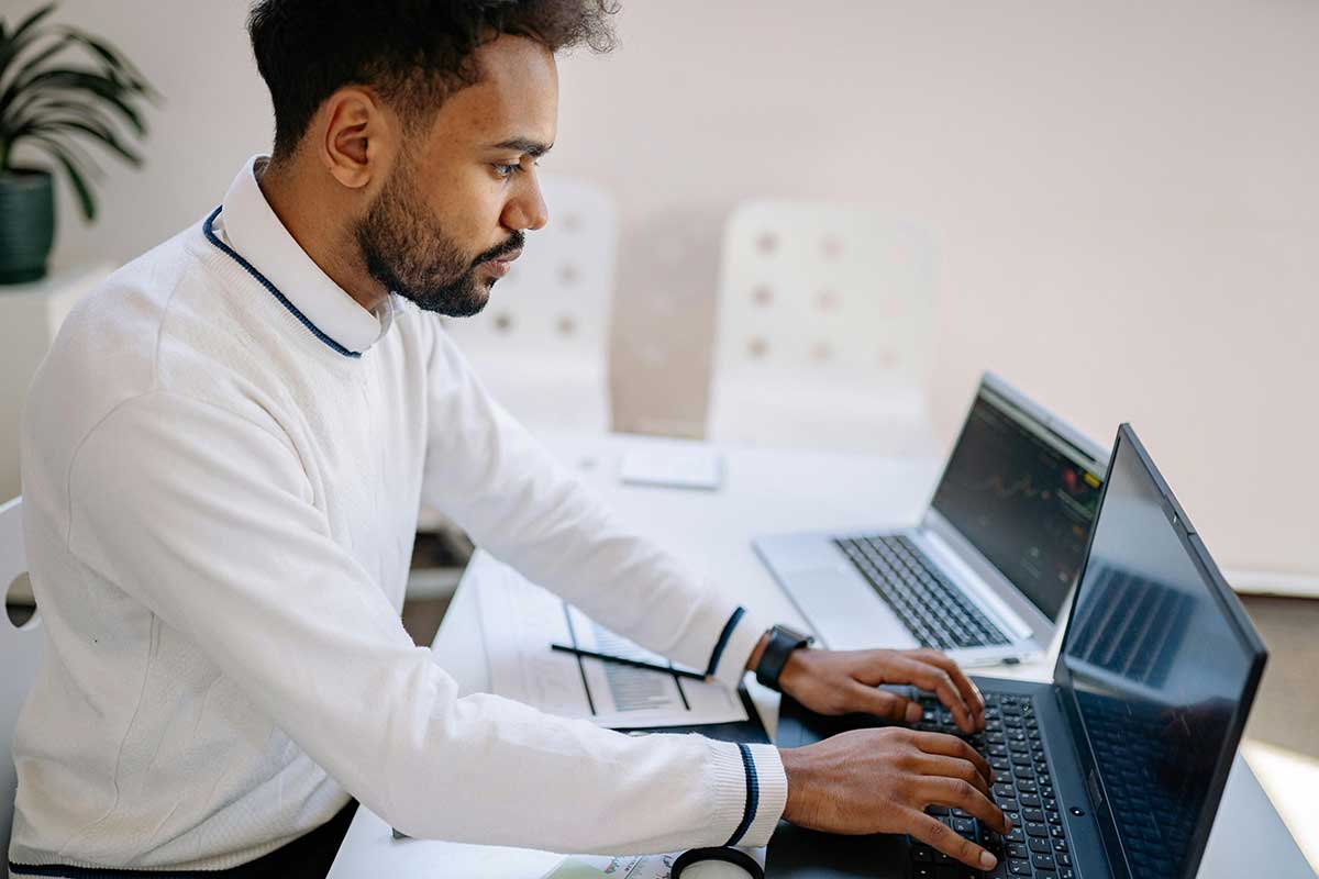 man on computer testing for regulatory compliance